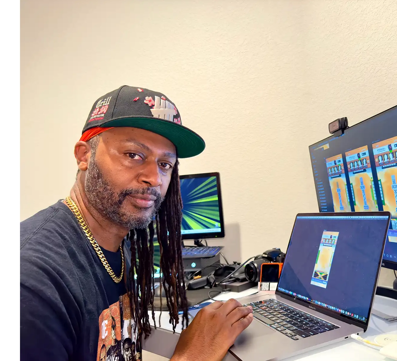 Cj Peters of Konsole Kingz working on Black Spades at his studio